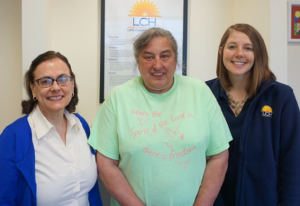 LCH patient, Dawn, with her caseworkers at LCH.