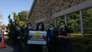 LCH staff pose in front of LCH Kennett Square to promote Amigos Event