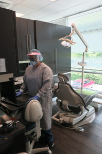 Image of Dental team preparing exam room