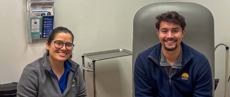 Image of Kate Hoffer and Christian in a Patient Room