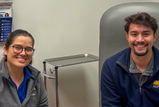 Image of Kate Hoffer and Christian in a Patient Room